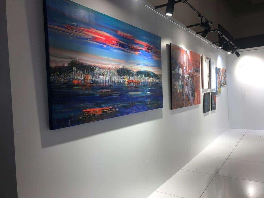 a wall with paintings on it